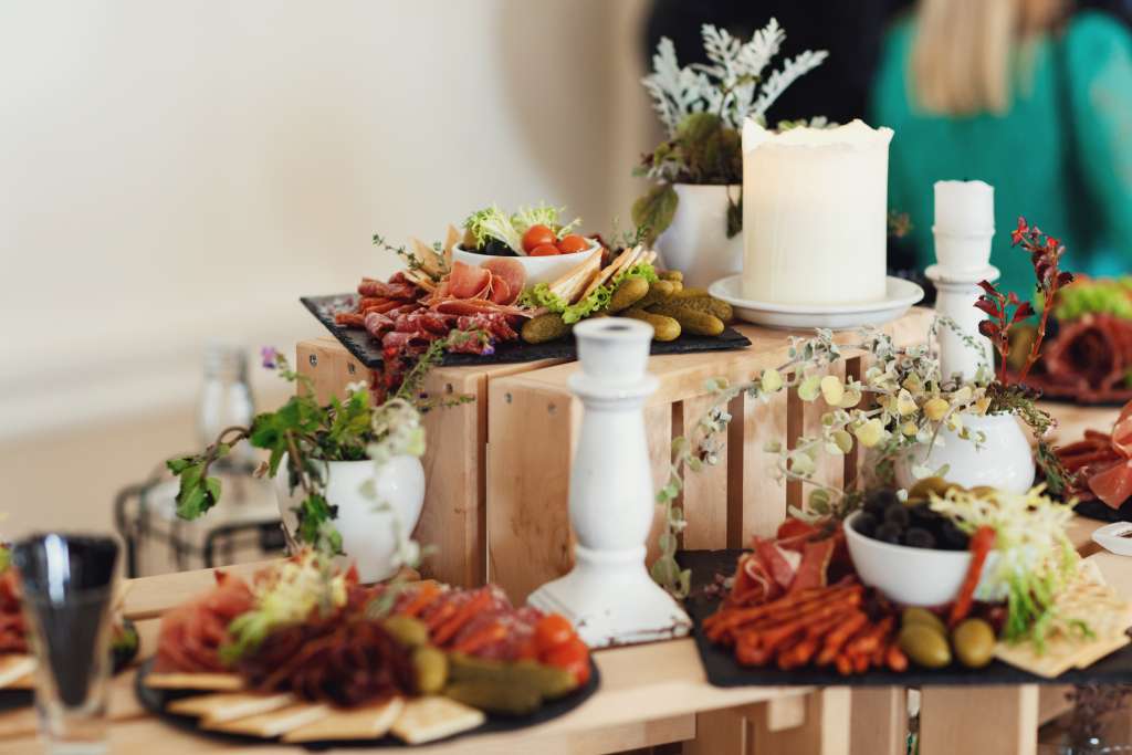 sliced cheese meat served plate with olivas stand wooden boxes