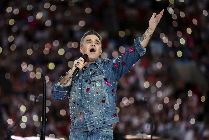 Which robbie williams album is best from life thru a lens to heavy entertainment show vote now as singer releases new record xxv chorcha entertainment